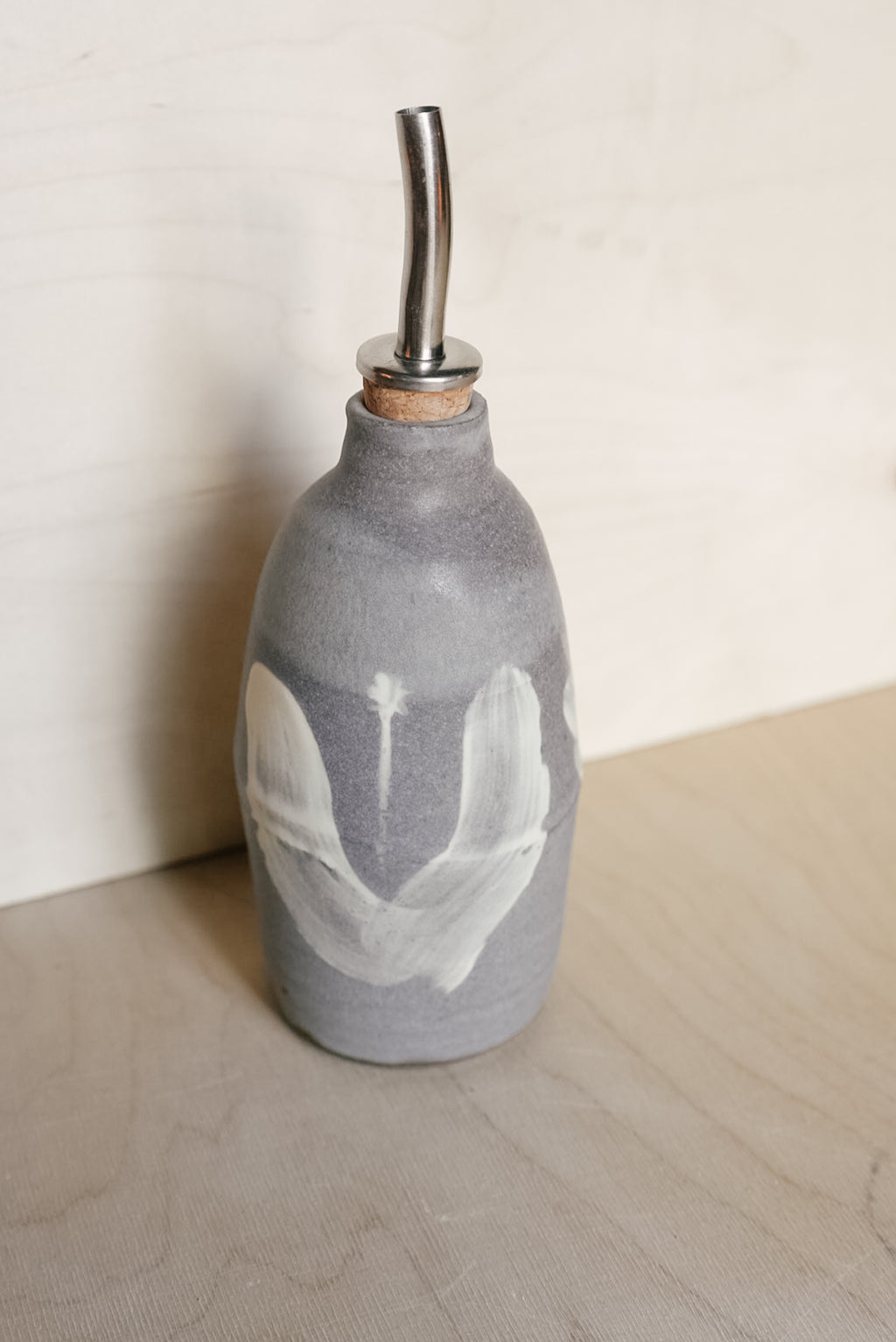 YO oil bottle with flowers