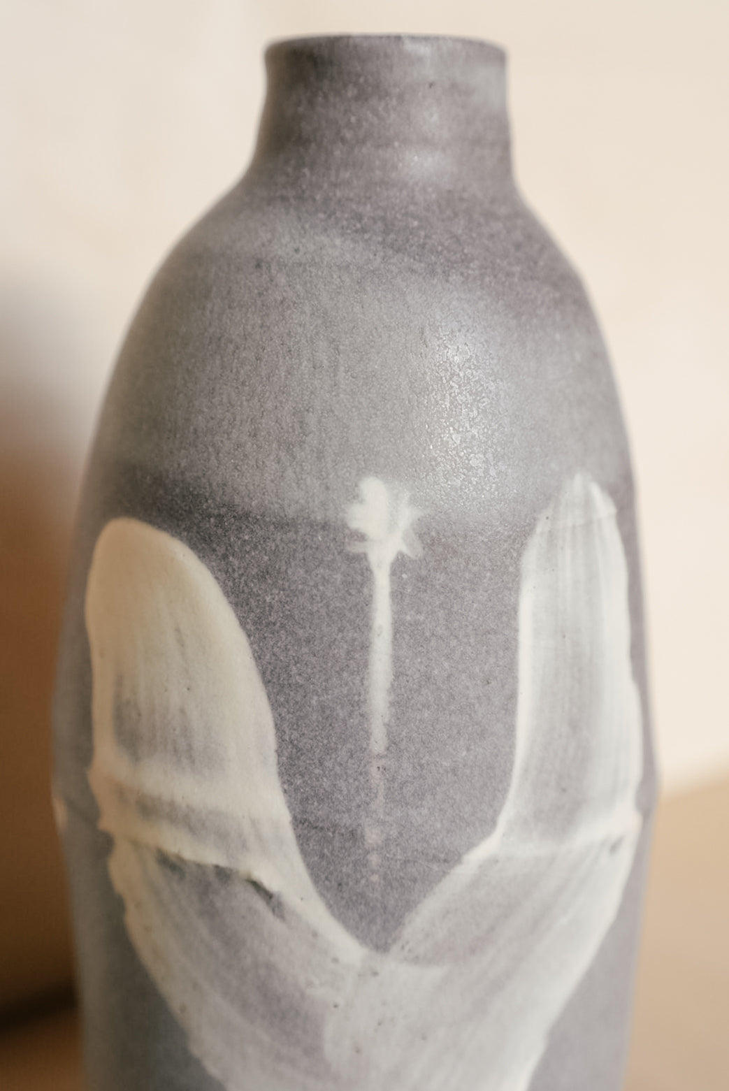 YO oil bottle with flowers