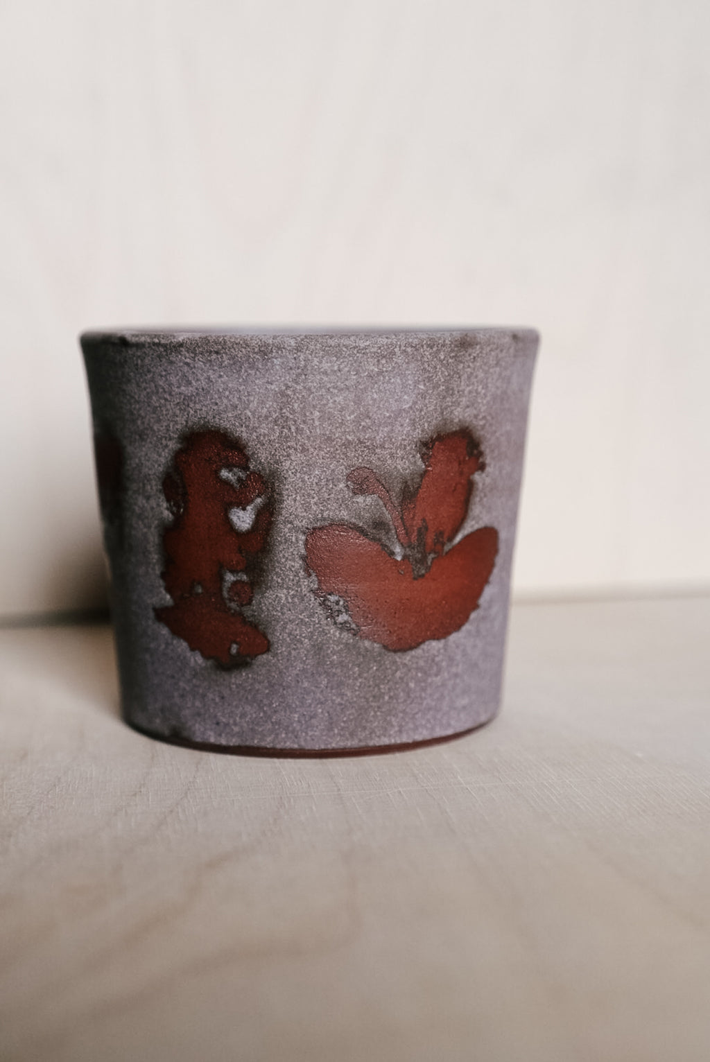 YO cup with abstract flowers