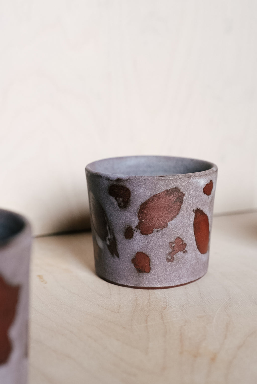 YO cup with leaves