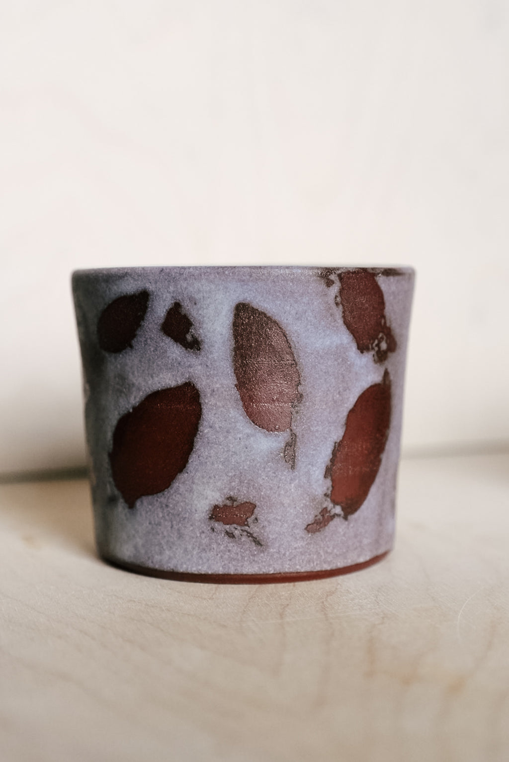YO cup with leaves