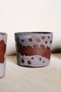 YO cup with a plant vine