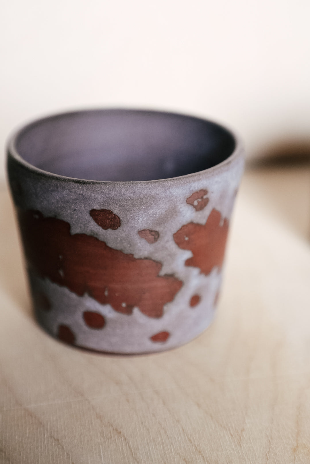 YO cup with a plant vine